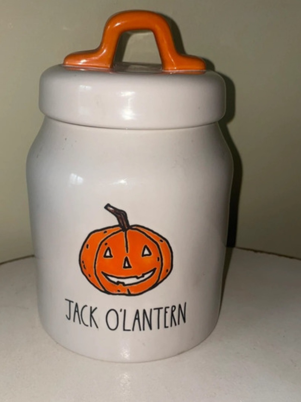 Rae Dunn White Ceramic 'Jack O'Lantern' Canister with Orange Handle